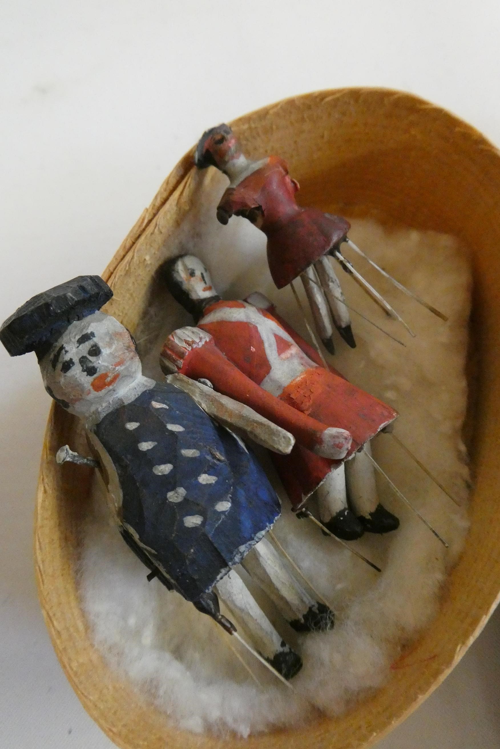 Three wooden piano dolls, c.1880, with painted features and jointed legs, largest 2 1/4" long, Image