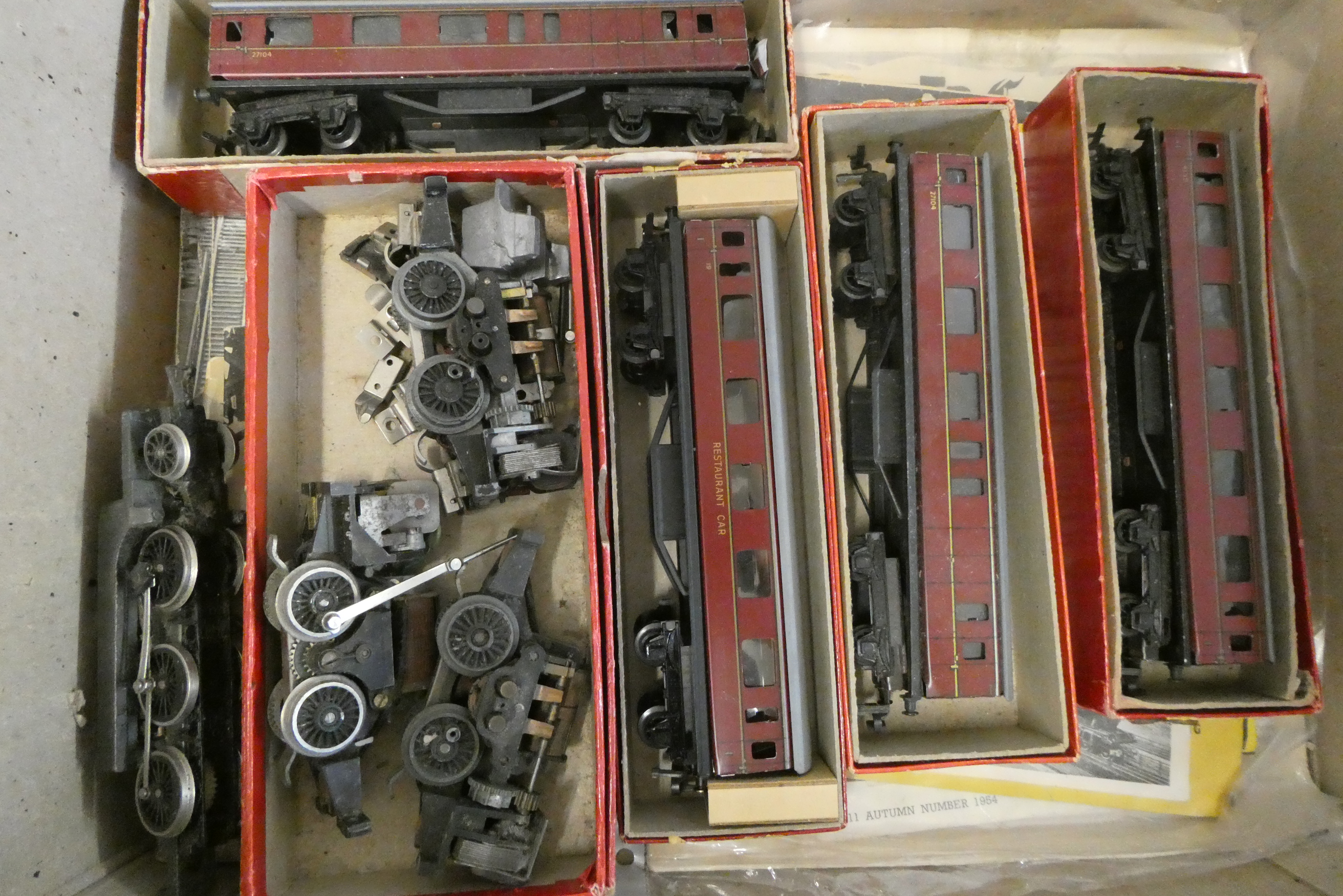 Playworn Trix Twin items including four locomotive chassis, two locomotives and four coaches, fair Image
