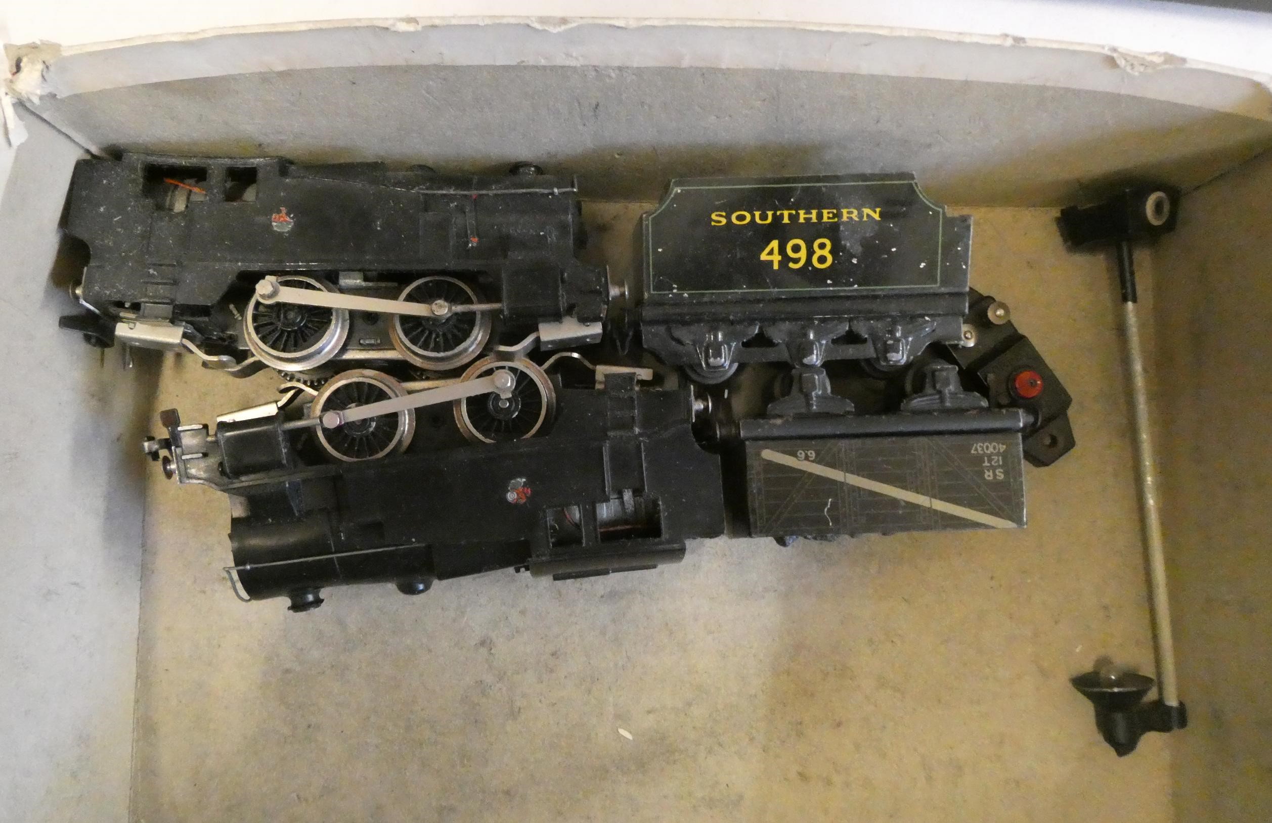 Playworn Trix Twin items including four locomotive chassis, two locomotives and four coaches, fair Image