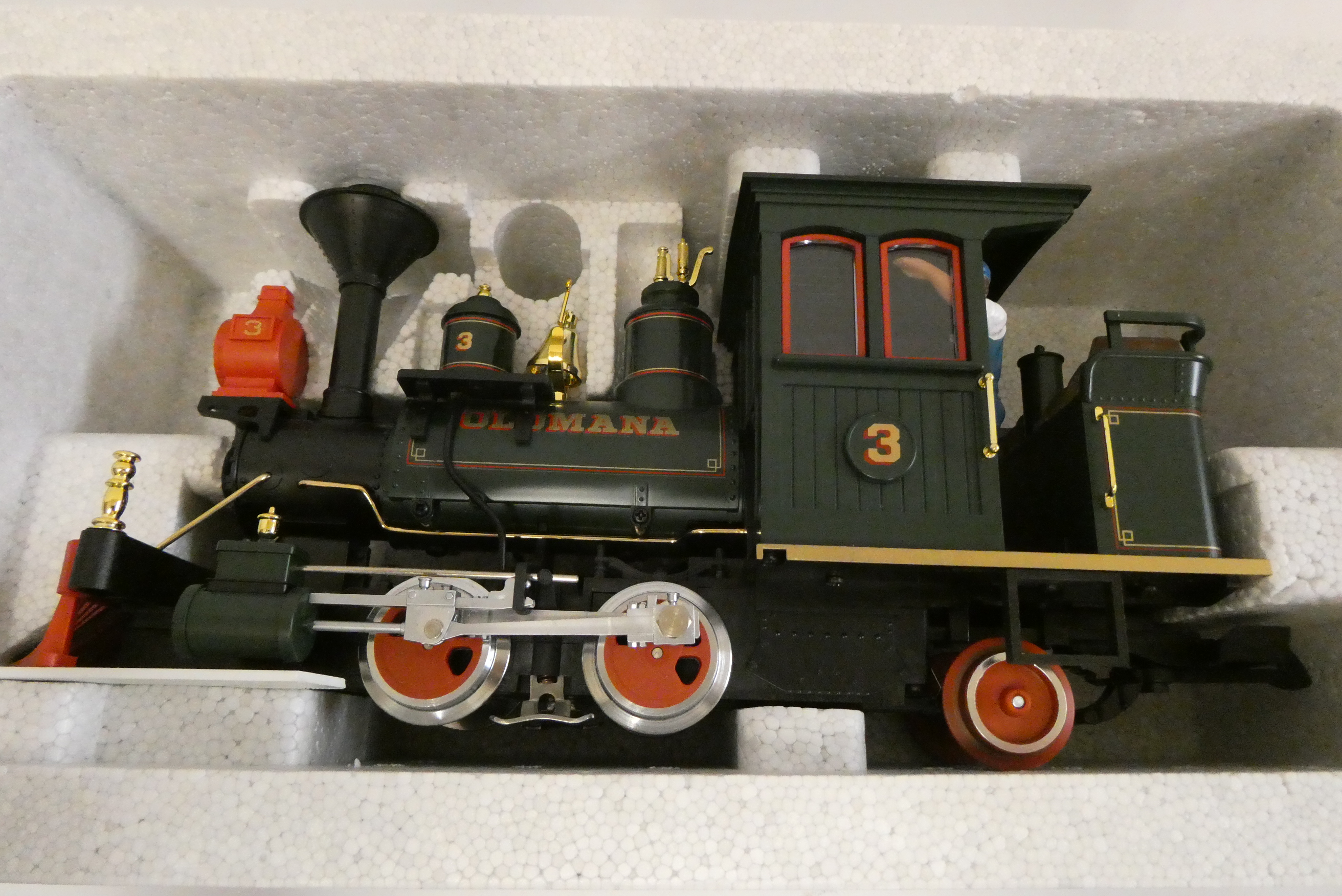 Three L.G.B models comprising 22130 0-4-2 locomotive, and two 4 wheel coaches, all items boxed, good Image