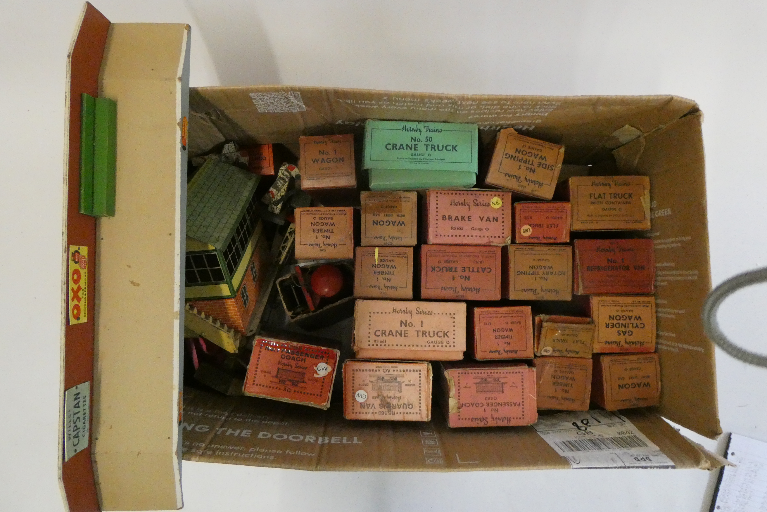 Twenty one Hornby goods wagons In pre-war and post-war boxes, all items in used condition from good Image