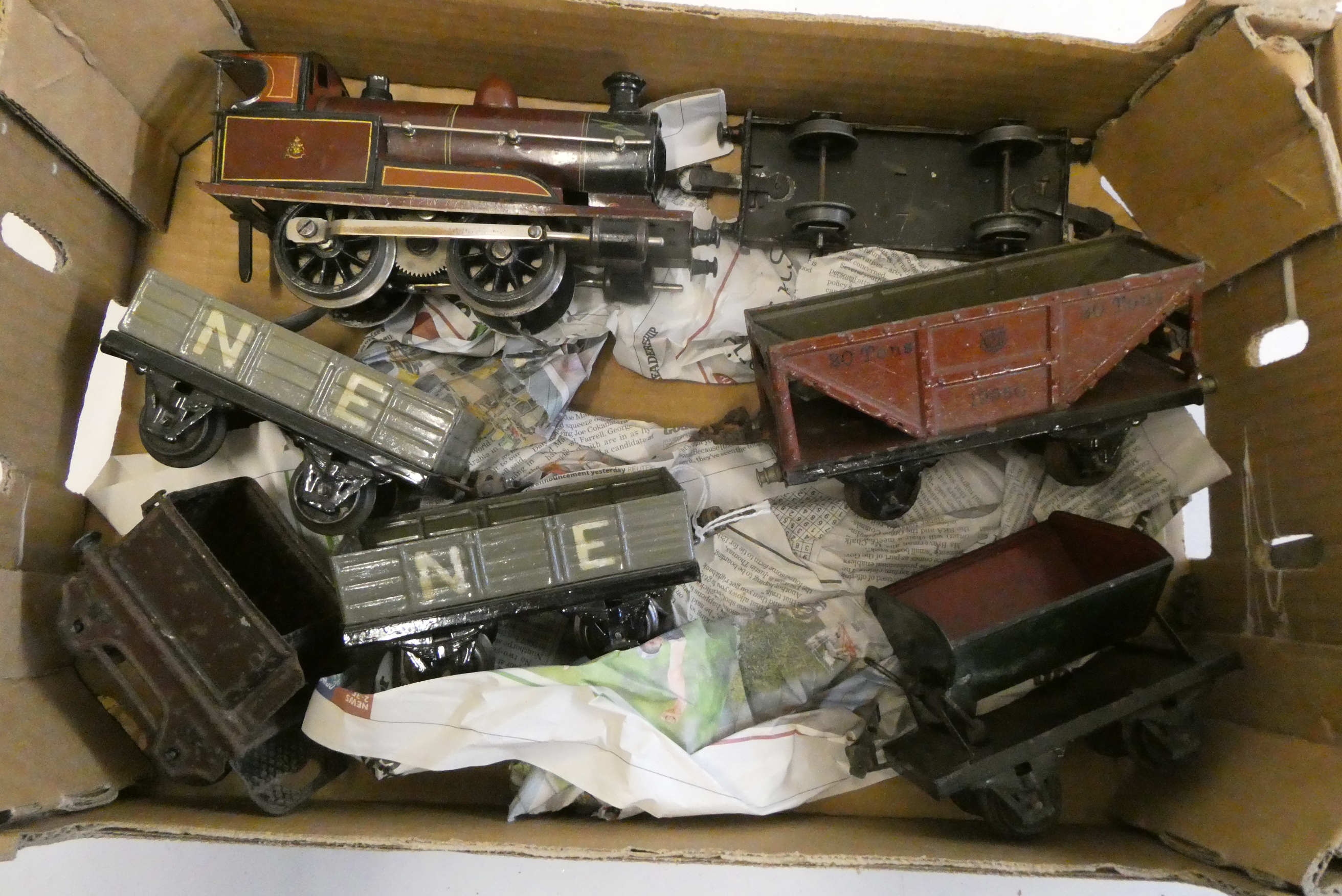 Marklin electric locomotive, tender missing and five Marklin goods wagons, fair Image