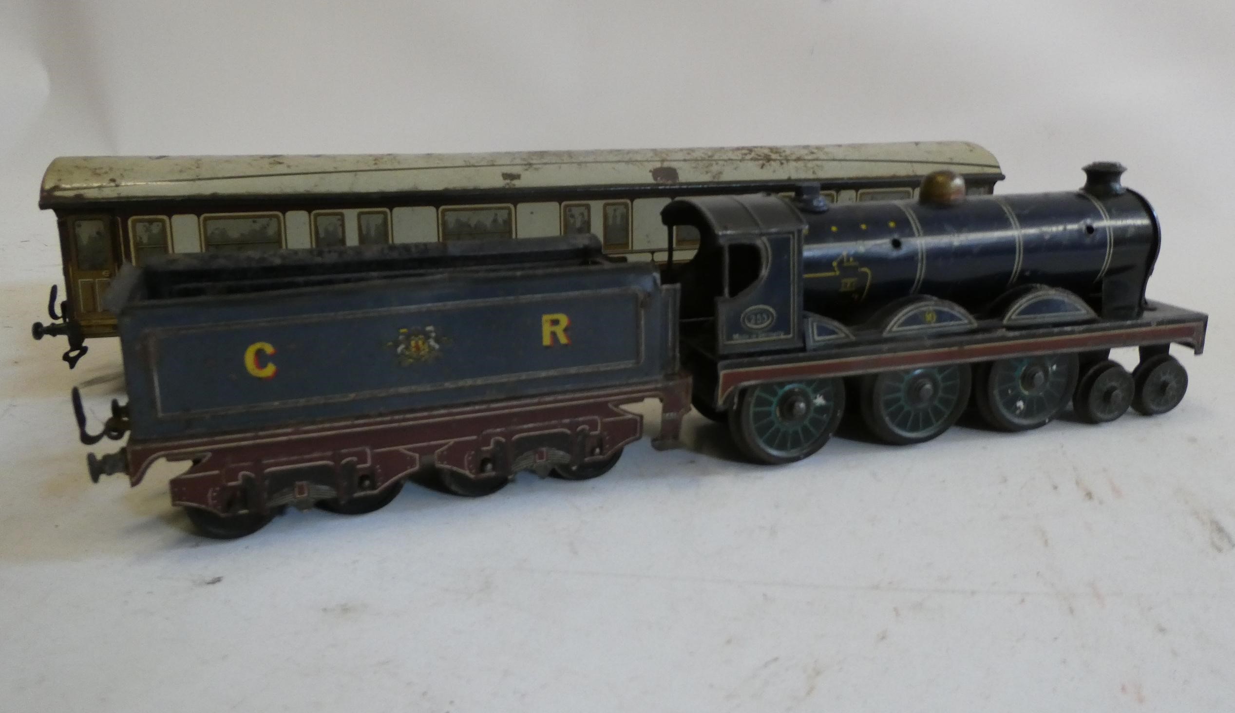 Carrette clockwork Floor Train Caledonian Railway Advertising model with C.R. Locomotive and coach, Image