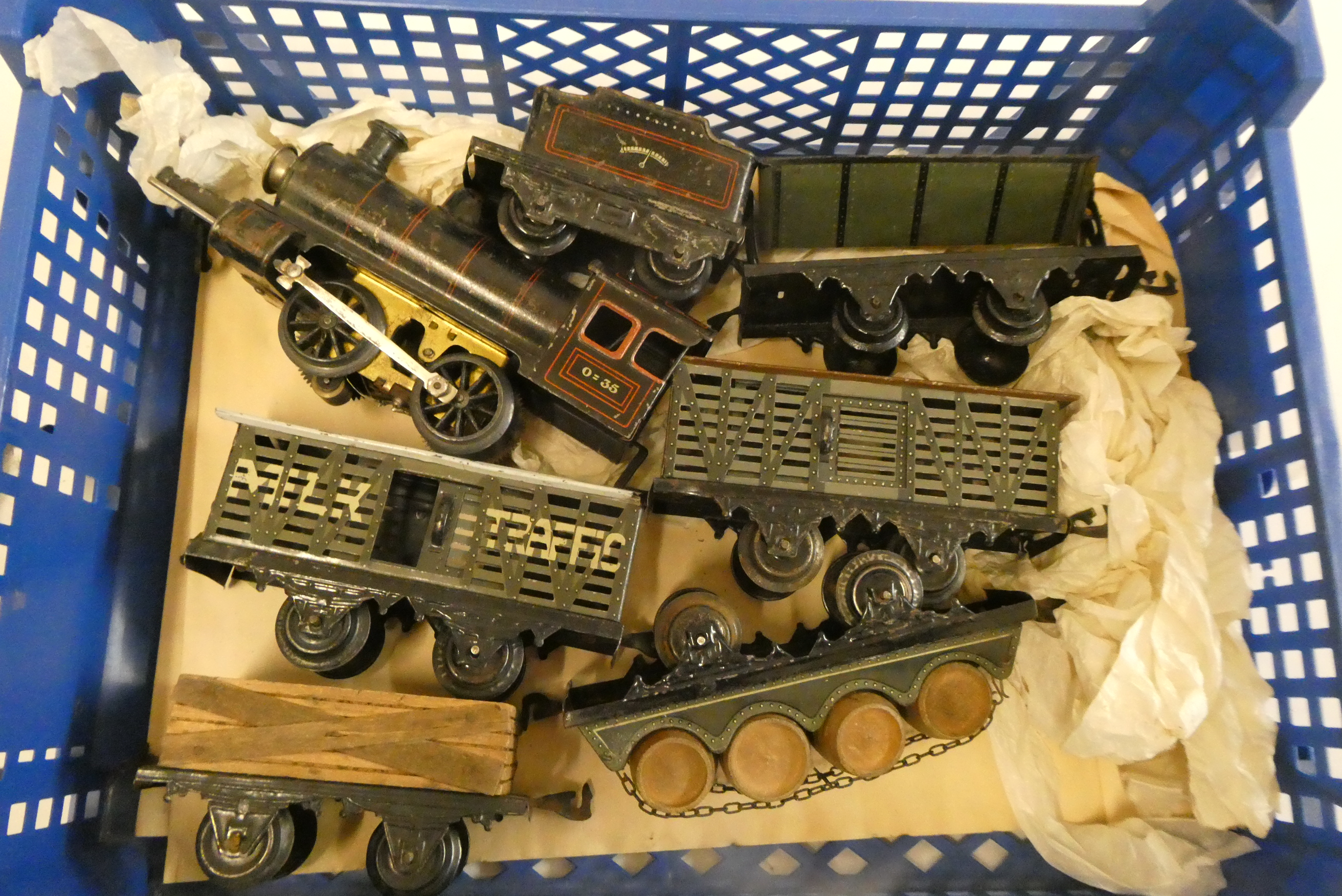 Bing electric locomotive and tender finished in black with five goods wagons, some paint wear on Image