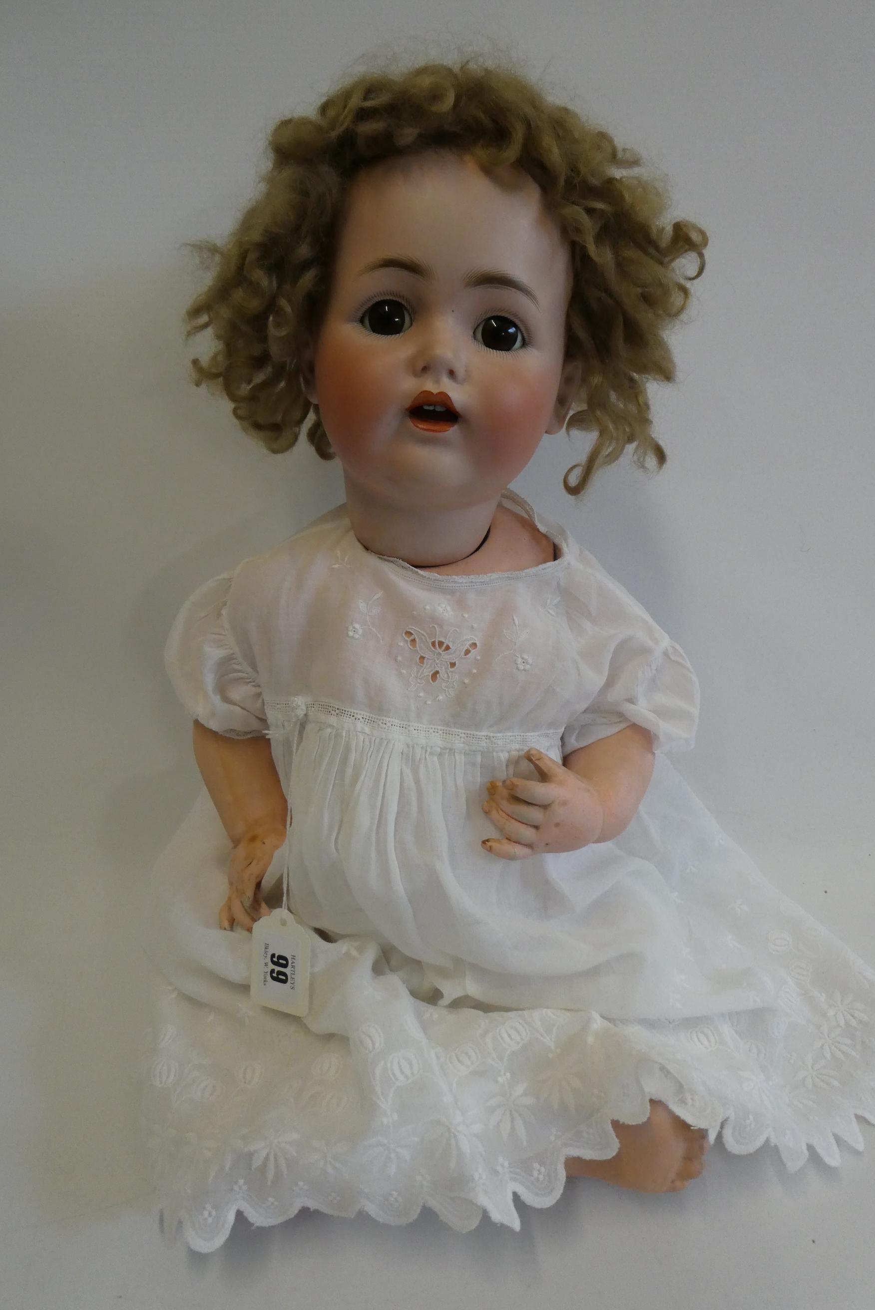 A J.D. Kestner bisque socket head character doll, with brown glass sleeping eyes, open mouth, Image