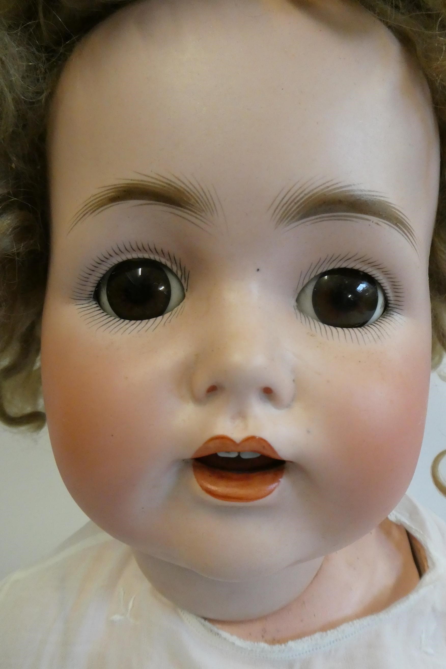 A J.D. Kestner bisque socket head character doll, with brown glass sleeping eyes, open mouth, Image