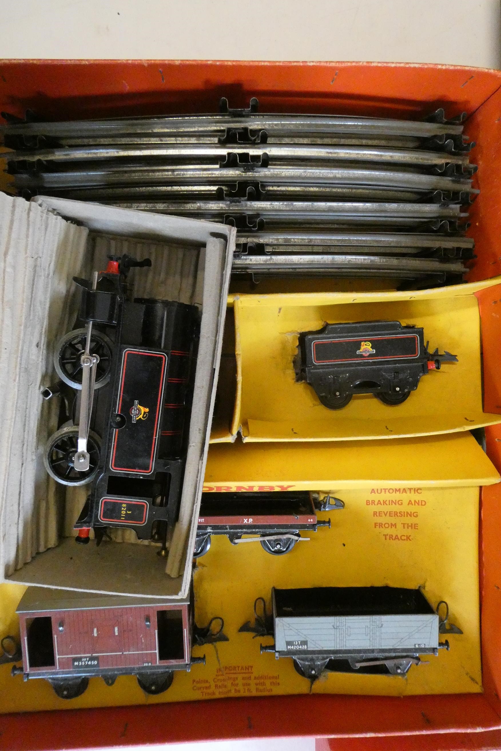 Playworn trains by Hornby and others including BR No40 clockwork tank locomotive, goods wagons, Image