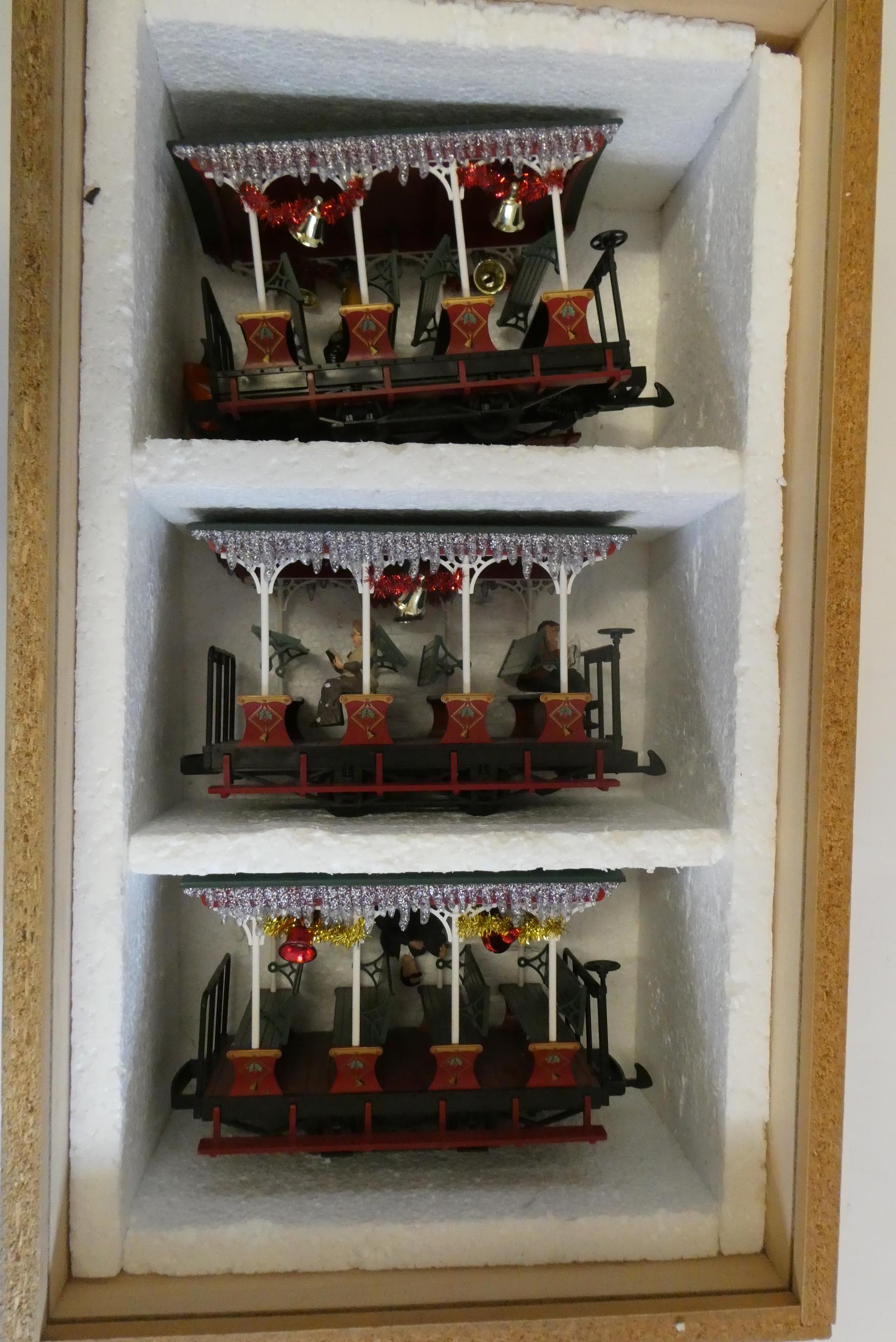 Three LGB 4 wheeled Christmas coaches with decorations and passengers, good to excellent Image