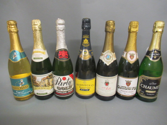 Seven bottles of sparkling wine including Heidsieck & Co. Monopole Blue Top Image