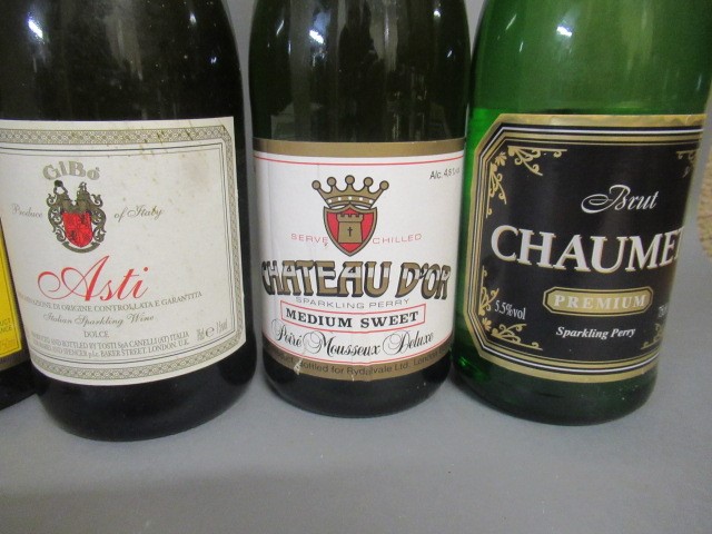 Seven bottles of sparkling wine including Heidsieck & Co. Monopole Blue Top Image