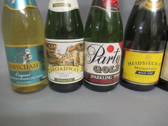 Seven bottles of sparkling wine including Heidsieck & Co. Monopole Blue Top Image