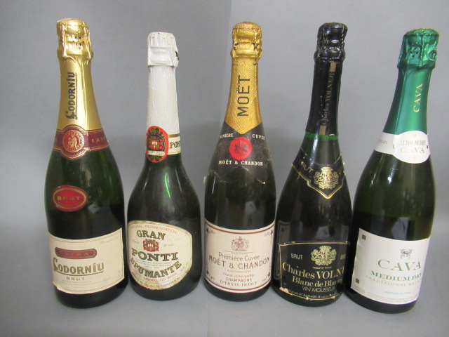 Five bottles of sparkling wine including Moet & Chandon premiere cuvee Image