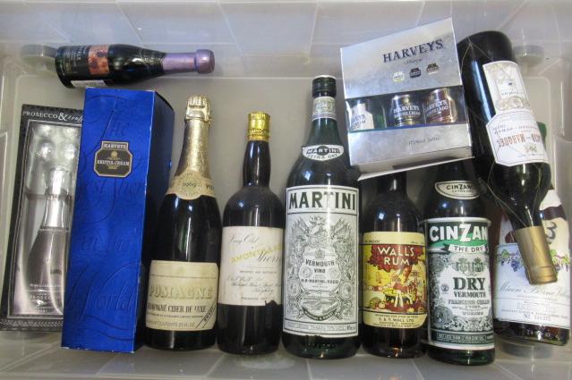 A quanitity of liqueur and wine Image