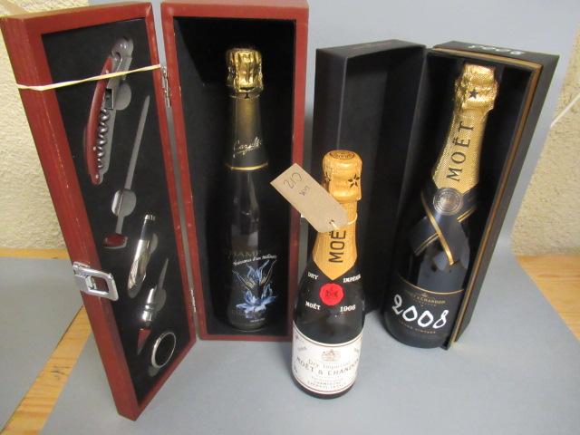 Three bottles of champagne Image