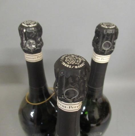 Three bottles Grand Siecle champagne Image