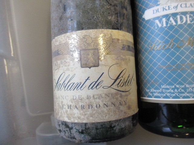 Ten bottles of mixed alcohol Image