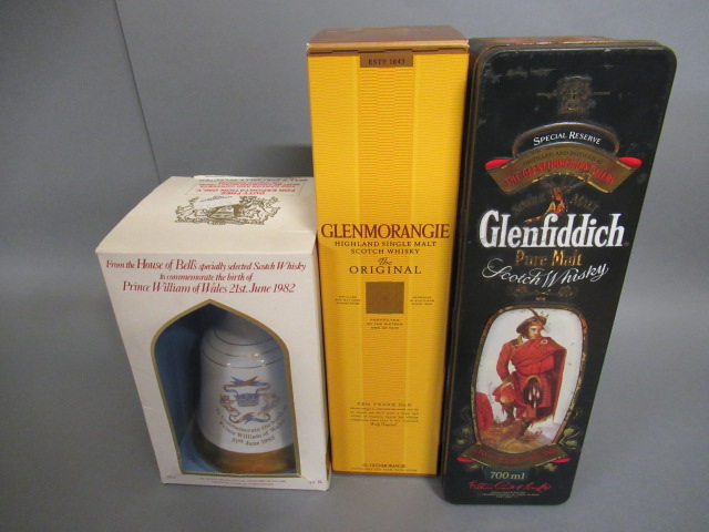 One bottle Glenfiddich special old reserve whisky in Drummond tin Image