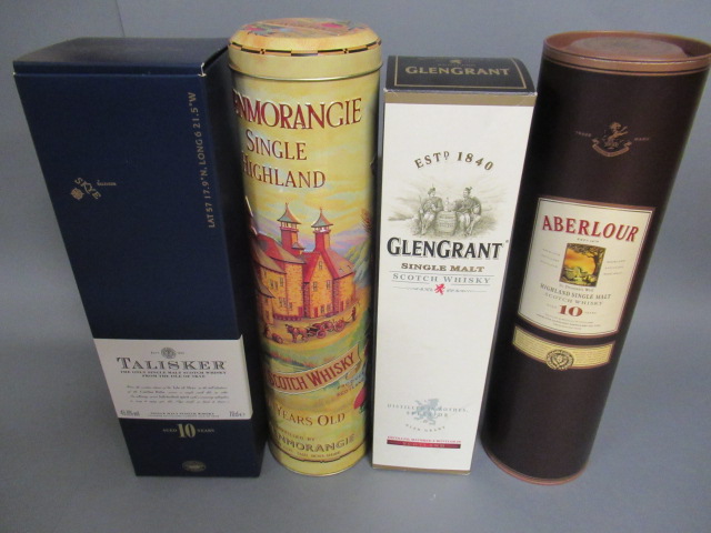 Four bottles of single malt whisky comprising a 10 year old Talisker Image