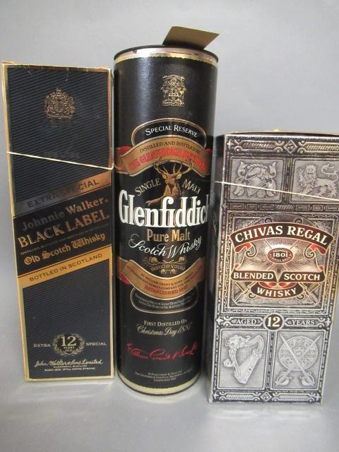 Three bottles of Scotch whisky Image