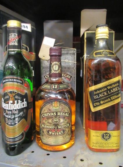 Three bottles of Scotch whisky Image