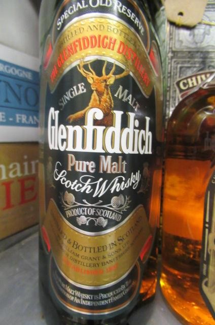 Three bottles of Scotch whisky Image