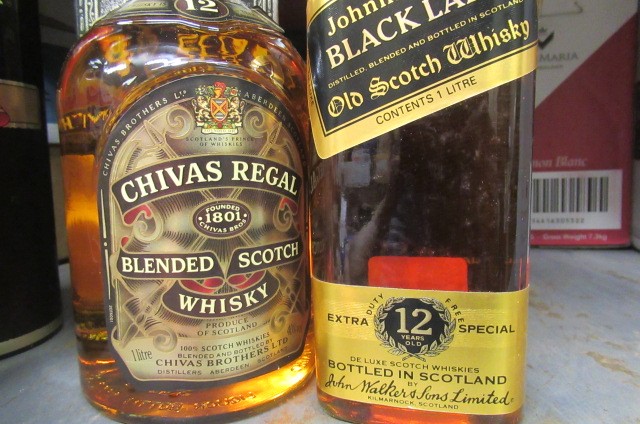 Three bottles of Scotch whisky Image