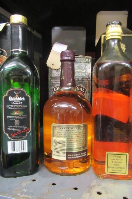 Three bottles of Scotch whisky Image