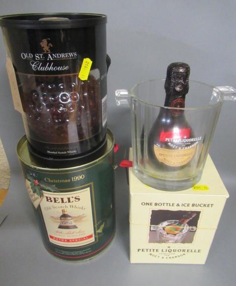 Two bottles of blended whisky comprising one Old St. Andrews Clubhouse and a Bells Whisky decanter Image