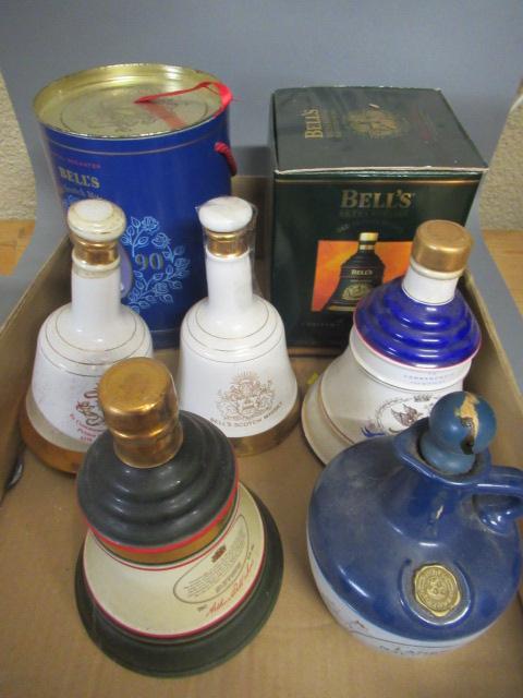 Four 75cl Bells Whisky decanters Image