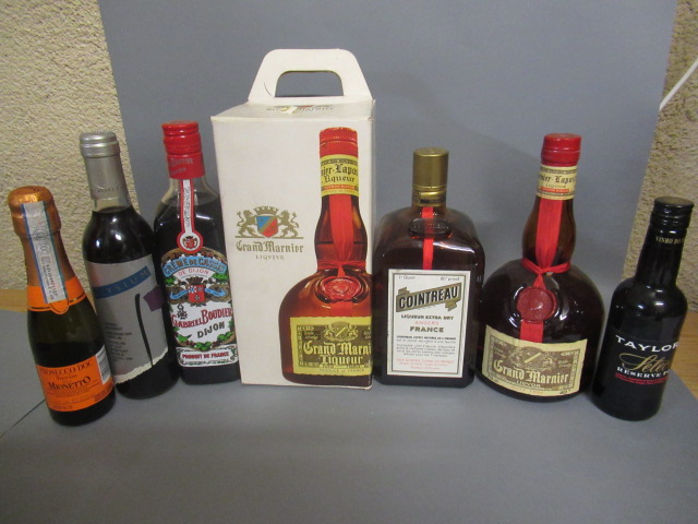 Seven assorted bottles Image