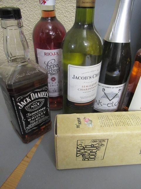 Twelve assorted bottles of liqueur and wine Image