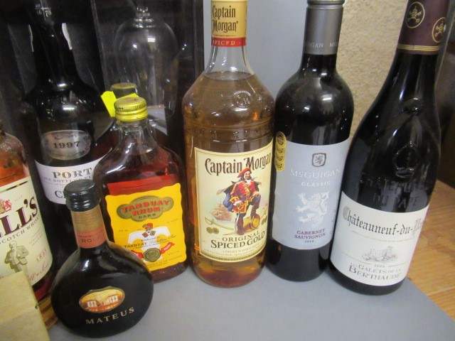 Twelve assorted bottles of liqueur and wine Image