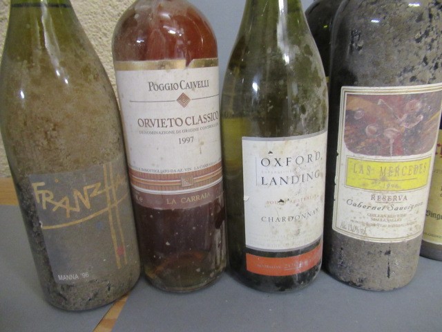 Fourteen bottles of New World and European wine Image