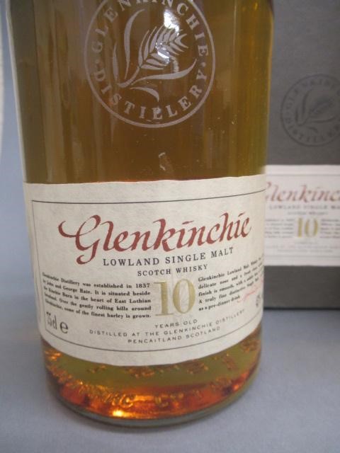 Two bottles of 10 year old single malt Scotch whisky Image