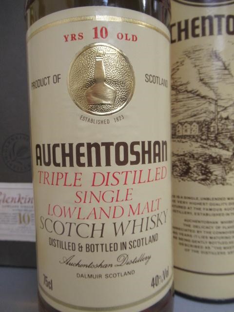Two bottles of 10 year old single malt Scotch whisky Image