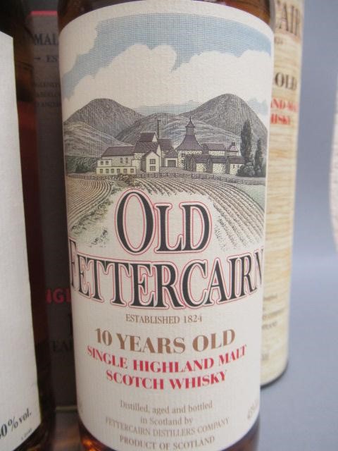 Three bottles of 10 year old Highland single malt whisky Image