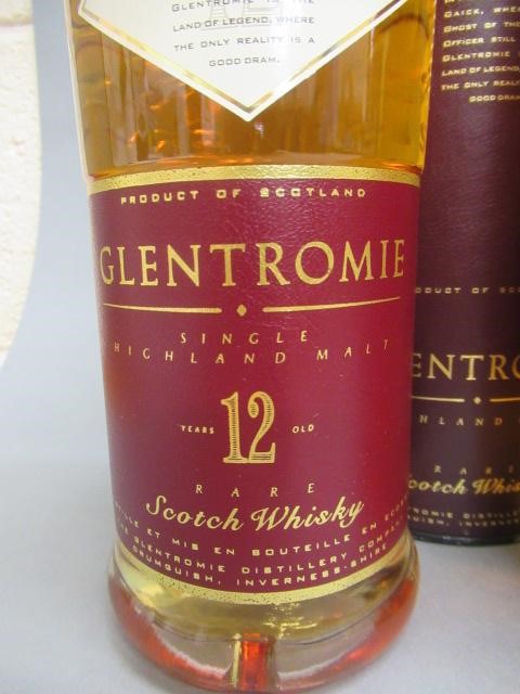 Three bottles of 12 year old Highland single malt whisky Image