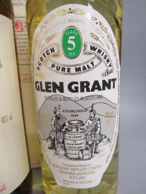 Three bottles of Scottish single malt whisky Image