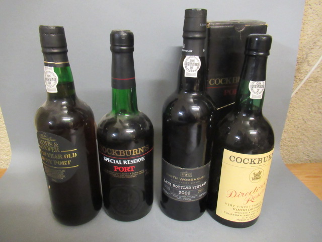Four bottles of port comprising Cockburns Directors Reserve Image