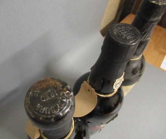 Three bottles of vintage port Image