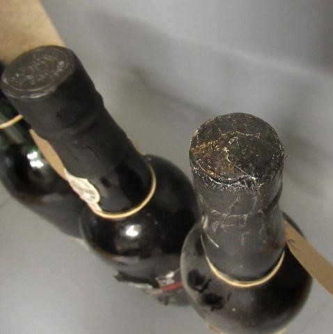 Three bottles of vintage port Image