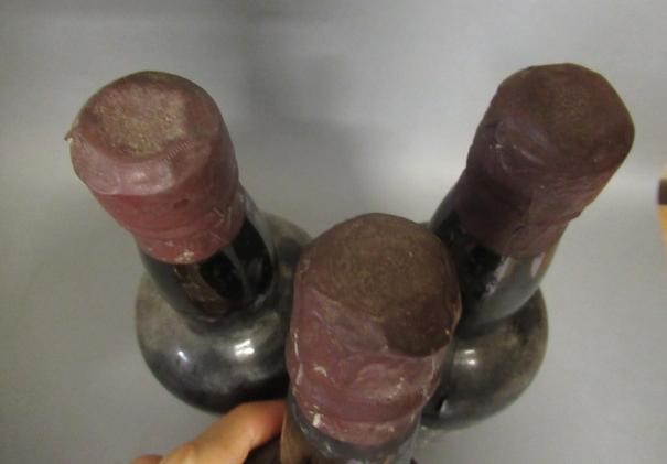 Three bottles of unknown port/spirits Image