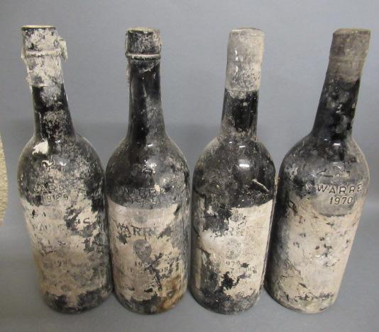 Four bottles Warre's vintage port Image
