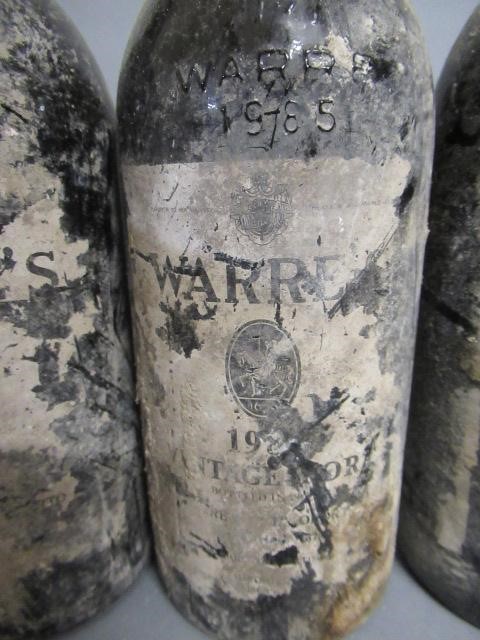 Four bottles Warre's vintage port Image