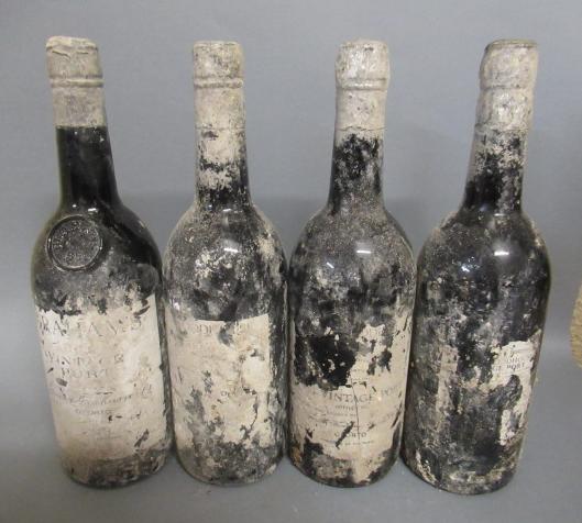 Four bottles of vintage port Image