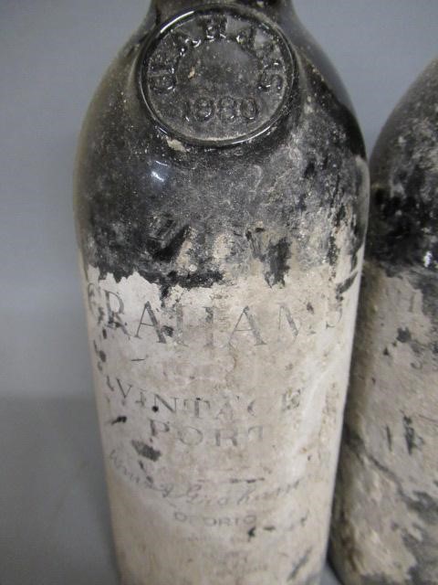 Four bottles of vintage port Image