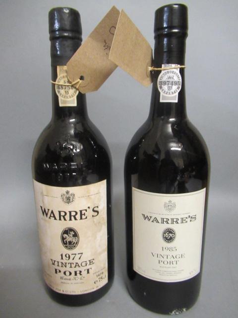 Two bottles of Warre's vintage port comprising one 1977 and one 1985 (Est. plus 21% premium inc. Image