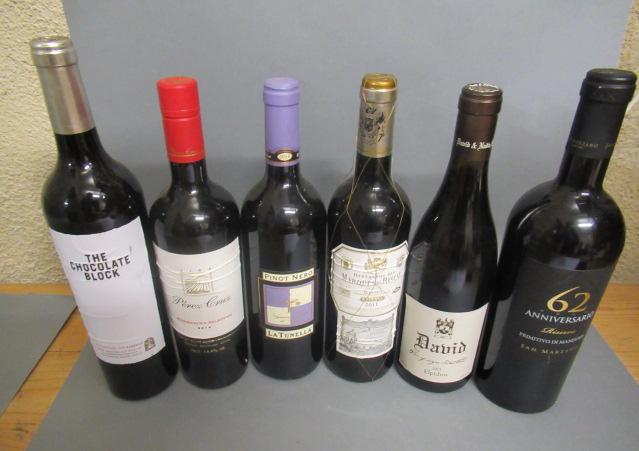 Six bottles of European and New World wines Image