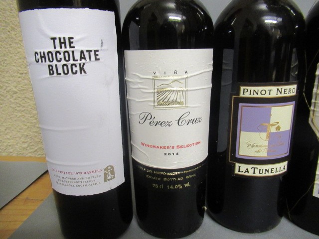 Six bottles of European and New World wines Image