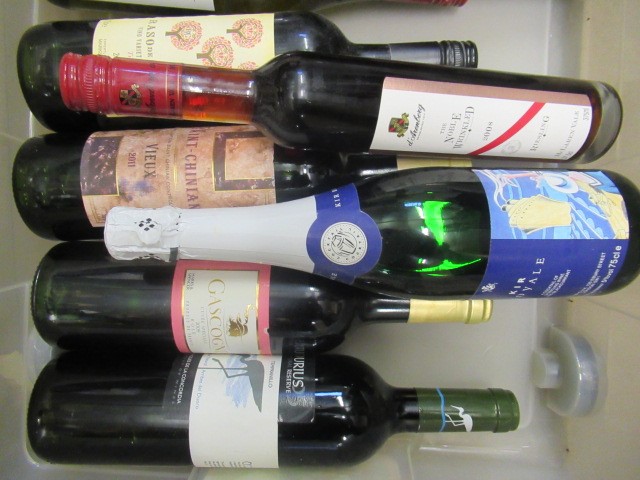 Thirteen bottles and one half bottle of European and New World wine Image